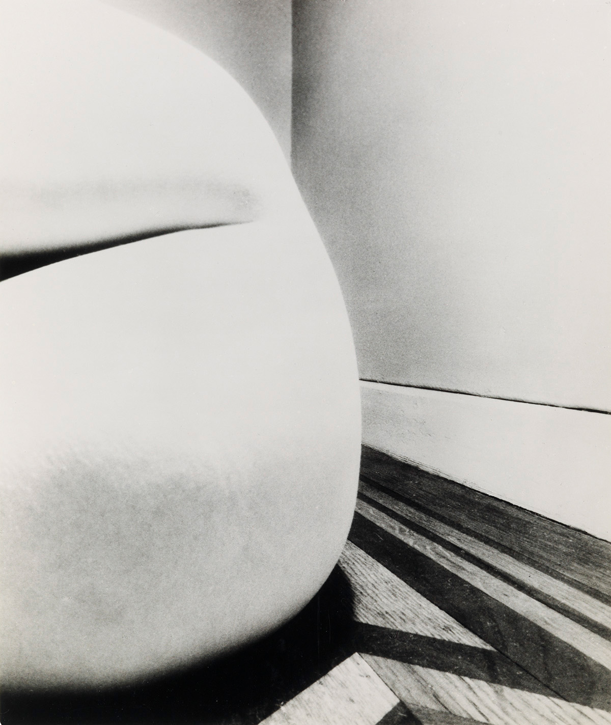 BILL BRANDT (1904-1983) Belgravia, London - Nude on Parquet Floor.